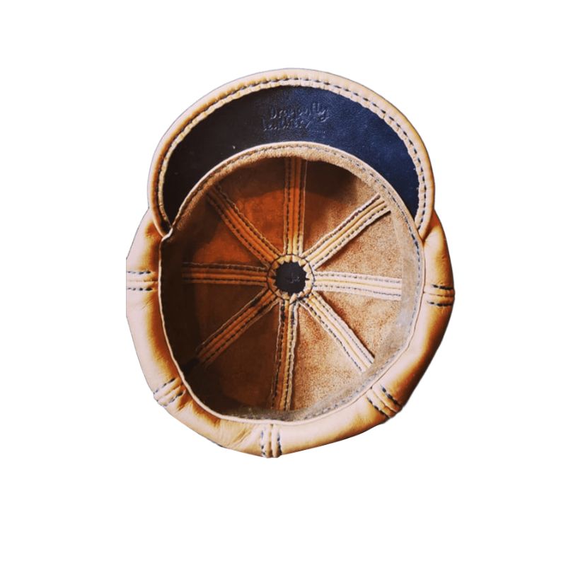 Brown leather newsletterboy caps inside
