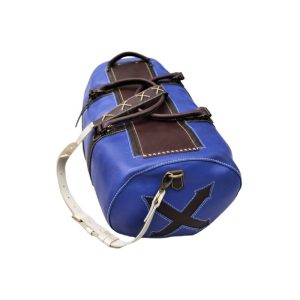 Handcrafted two-tone cobalt blue and dark brown full-grain leather barrel duffle bag with cross-lace panel detailing, brass hardware and white leather shoulder strap by Dragonfly Leather, Port Elizabeth